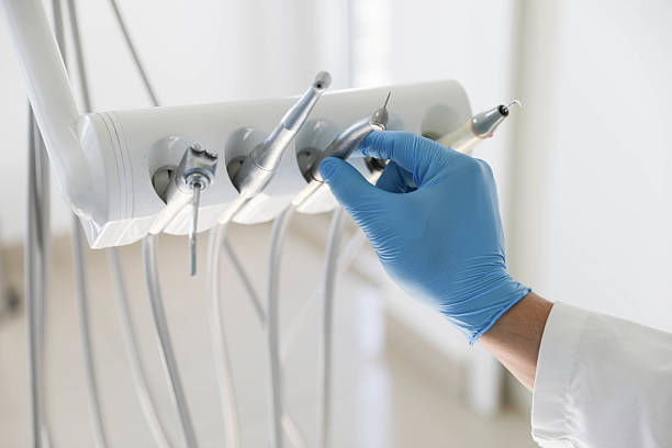 Professional Root Canal Treatment technician working in K. I. Sawyer, MI
